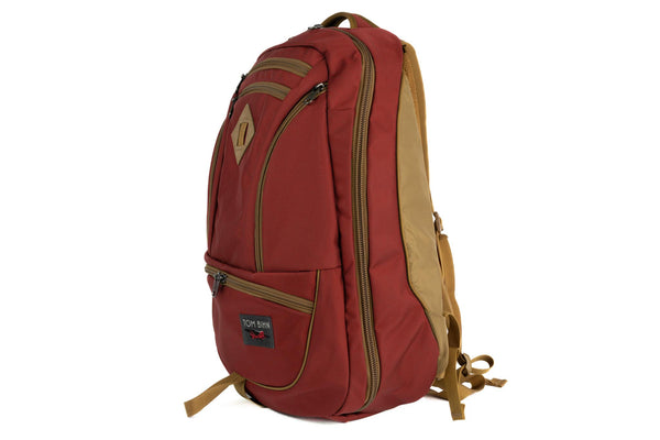 A profile shot of the Guide's Edition Synik 30 in Mars Red 630 Ballistic.